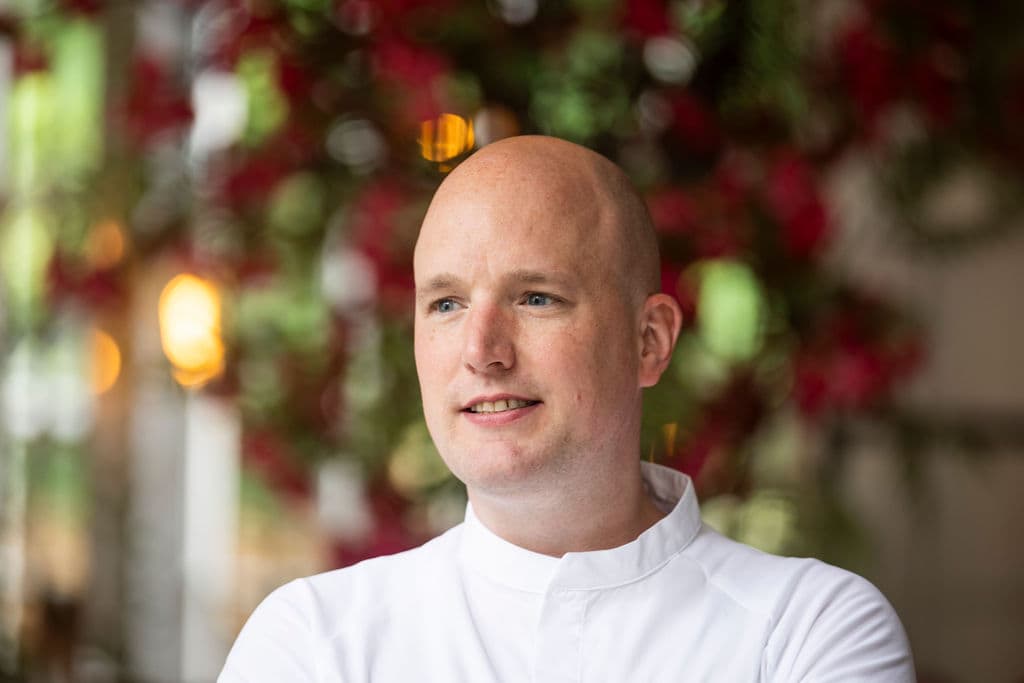 Private chef Tjitze van der Dam — chef whites, contemplatief
